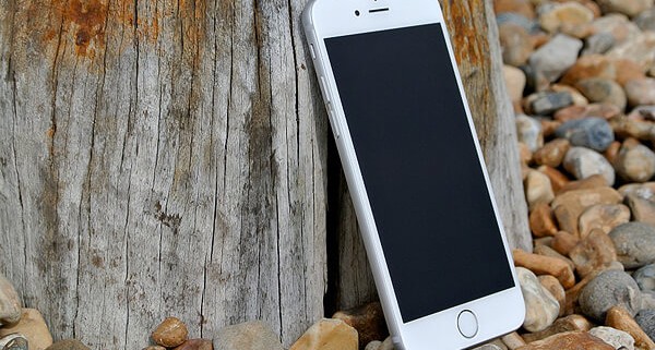 apple mobile on the wood