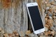 apple mobile on the wood